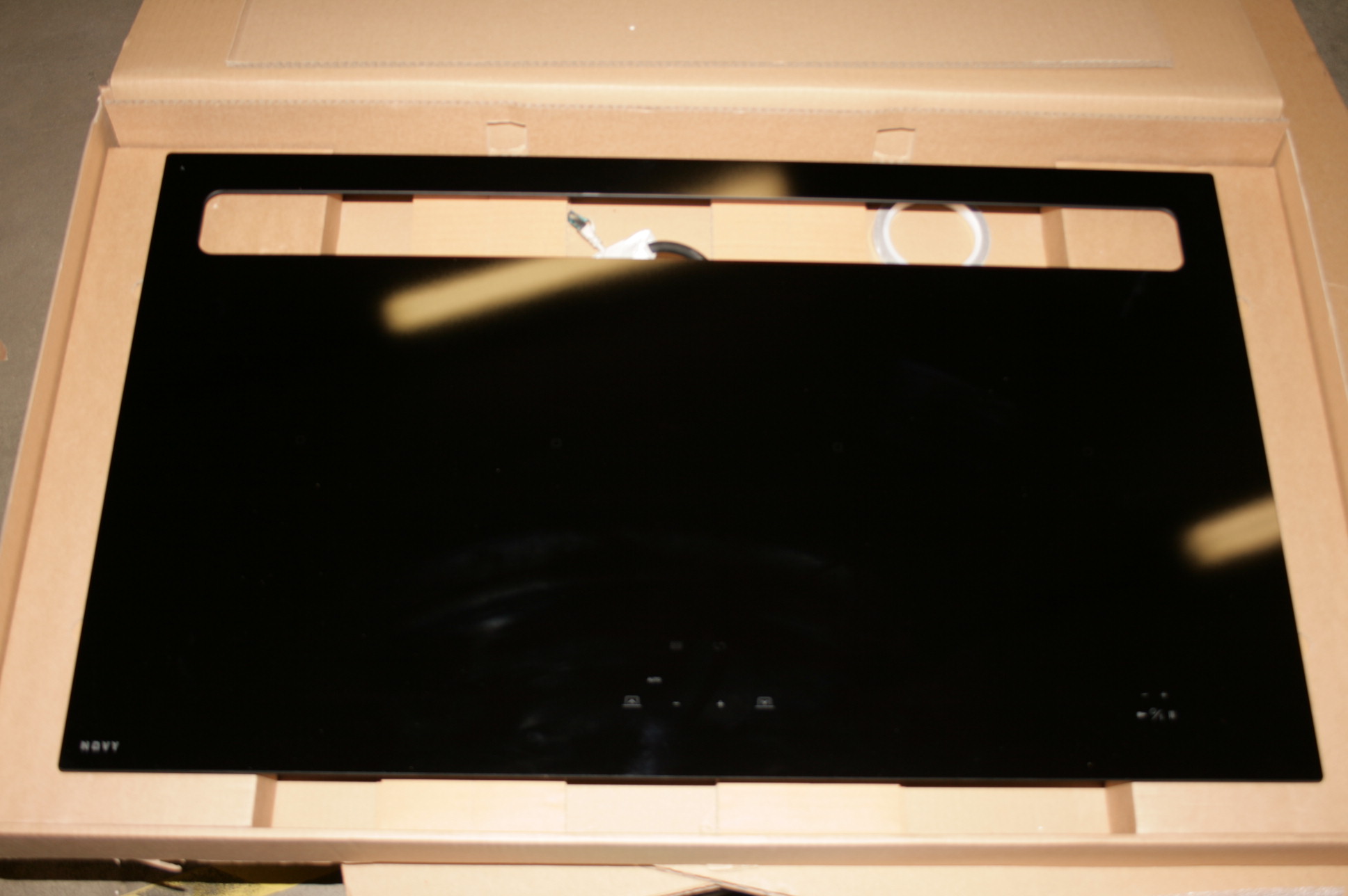 SALE OUT. - Novy - 1821 - Induction hob with built-in hood - 88 cm - Number of burners/cooking zones 4 - Yes - Black - Slider control with white LEDs. - USED, REFURBISHED, SCRATCHED